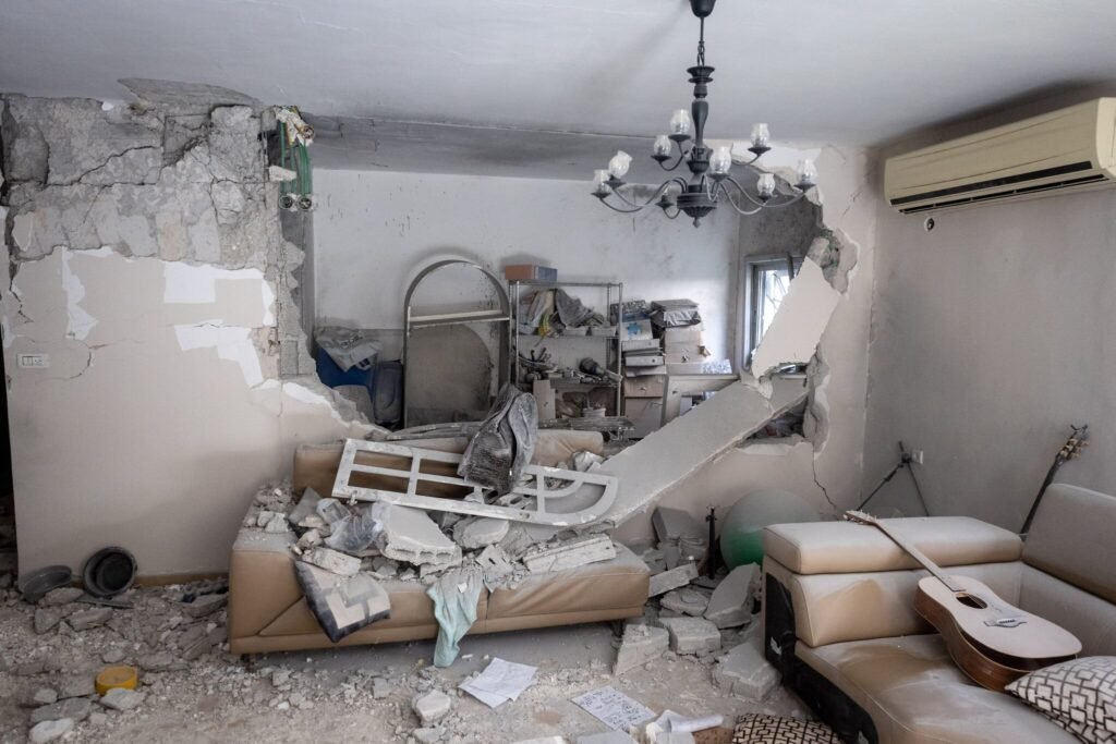 Injuries and heavy damage to homes as Iran fires multiple missile salvos at Israel